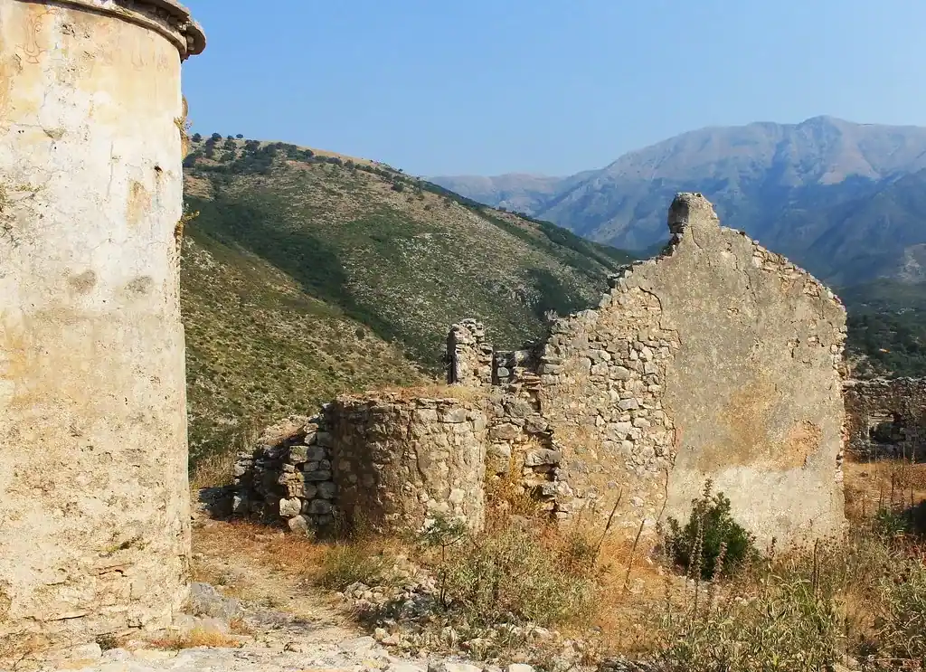 The ancient stone walls of Himarë Castle above the coast