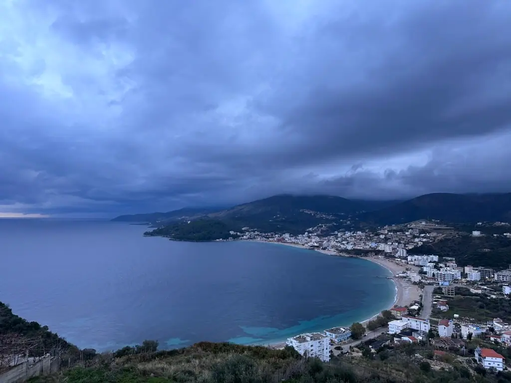 Sunset over Spile beach near Himara Downtown Hostel in town center