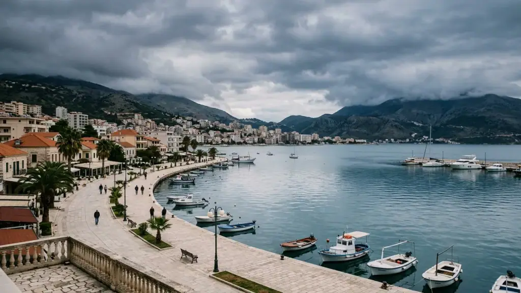 Saranda waterfront in October under soft autumn light with calm sea and quiet promenade