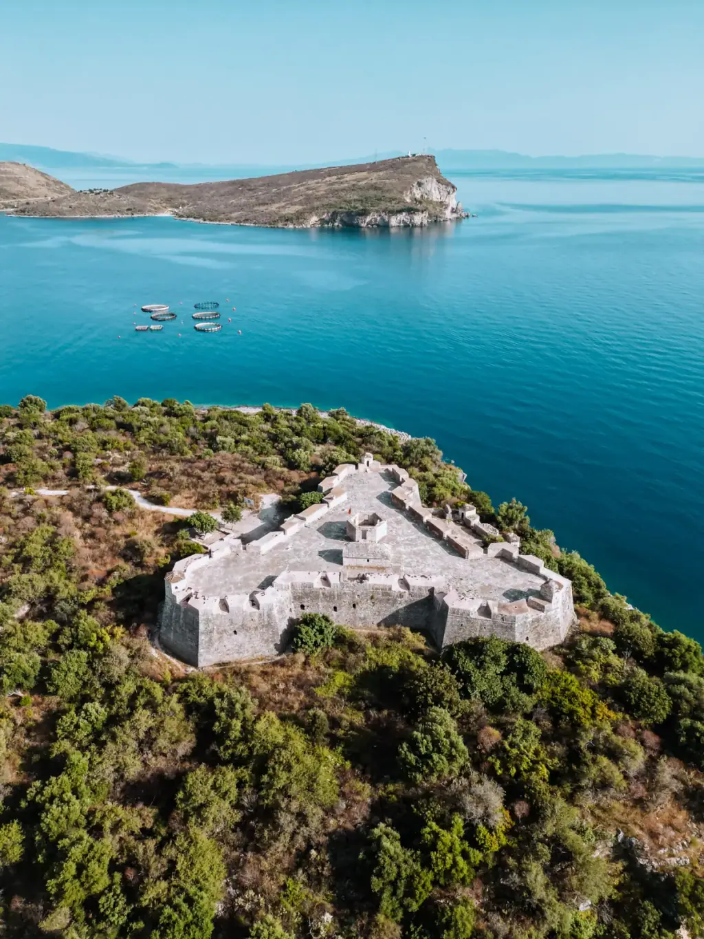 Ali Pasha's triangular castle on the Porto Palermo peninsula viewed from the bay