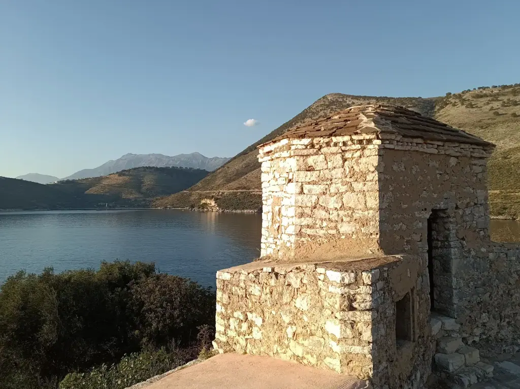 Castle stonework at Porto Palermo above the bay