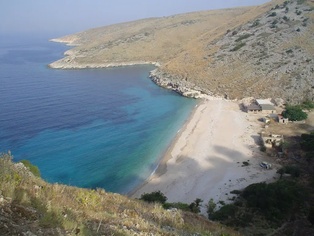 Llamani cove and its white shore seen from the hillside