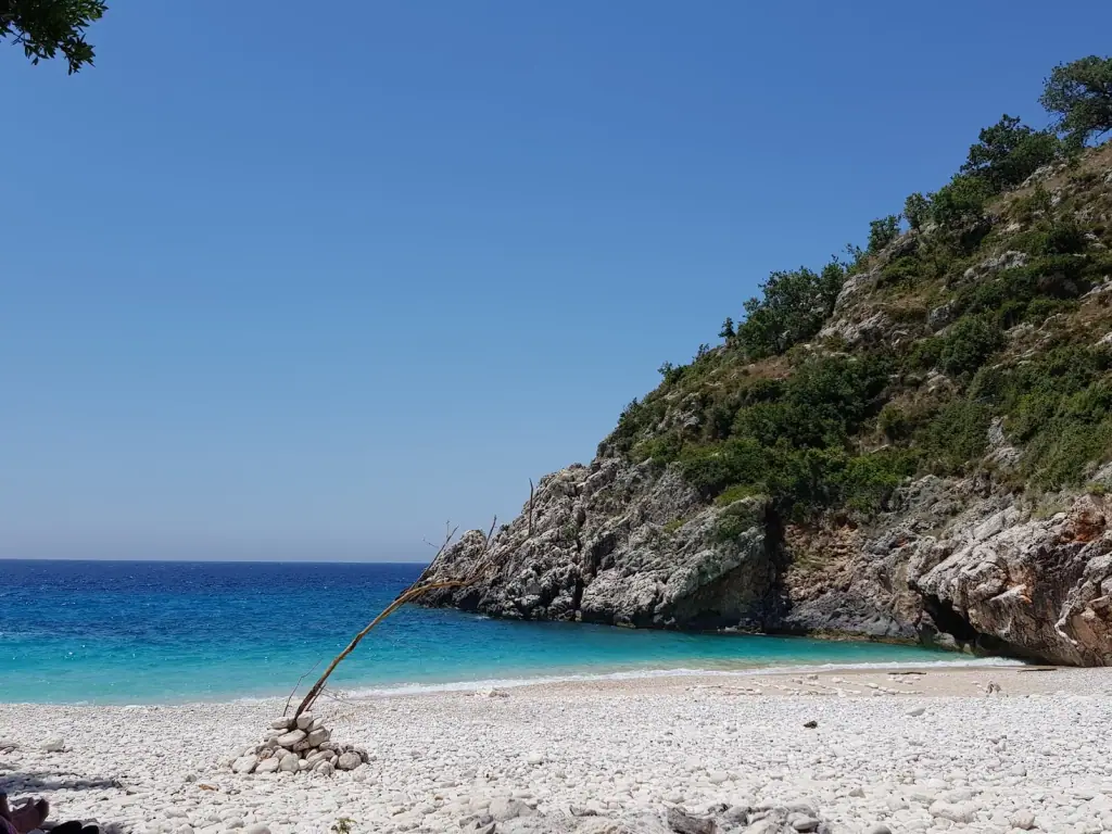 The beach at Saint Andrew's Bay below its headland