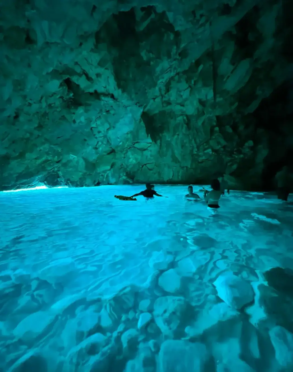 Deep blue interior of a sea cave on the Albanian Riviera, evocative of Thunder Cave