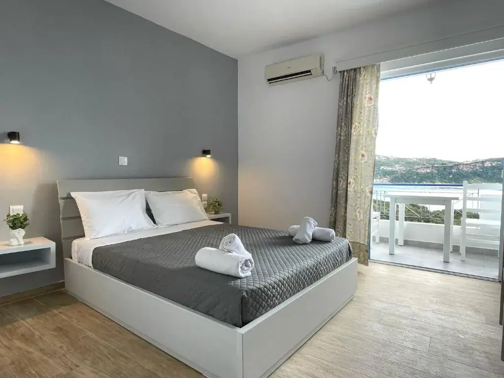 Deluxe Triple Room with Sea View at Enopia Apartments Himara