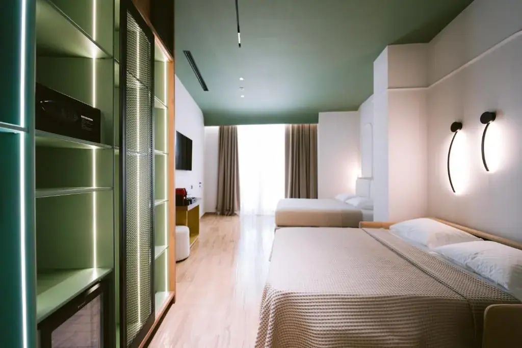 Family Room with Balcony at Noemie Hotel