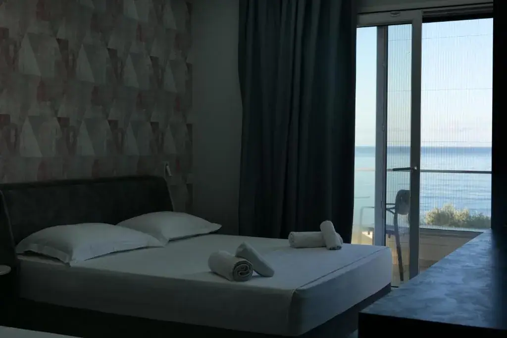 Premiere Triple Room with Sea front and Private Balcony at The Blue Wave Hotel