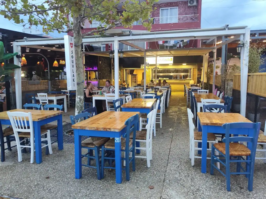 Outdoor taverna seating at I Love Souvlaki in Himara