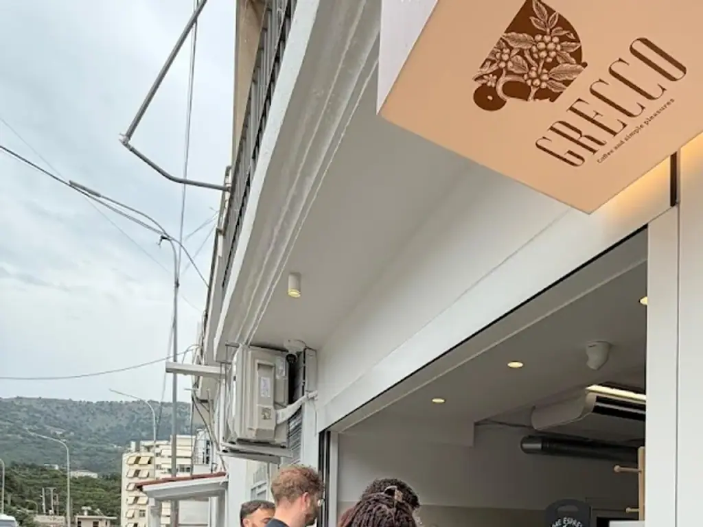 Grecco coffee and pastry kiosk on the main road through central Himara