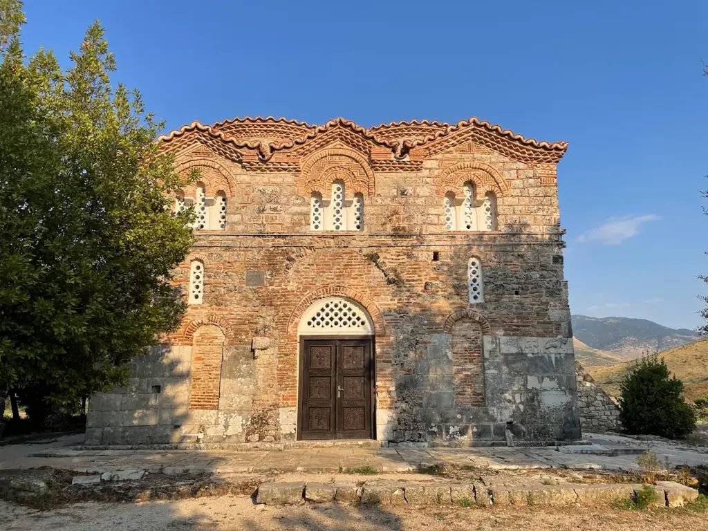 The Byzantine brick-and-stone facade of St. Nicholas Monastery church at Mesopotam near Saranda