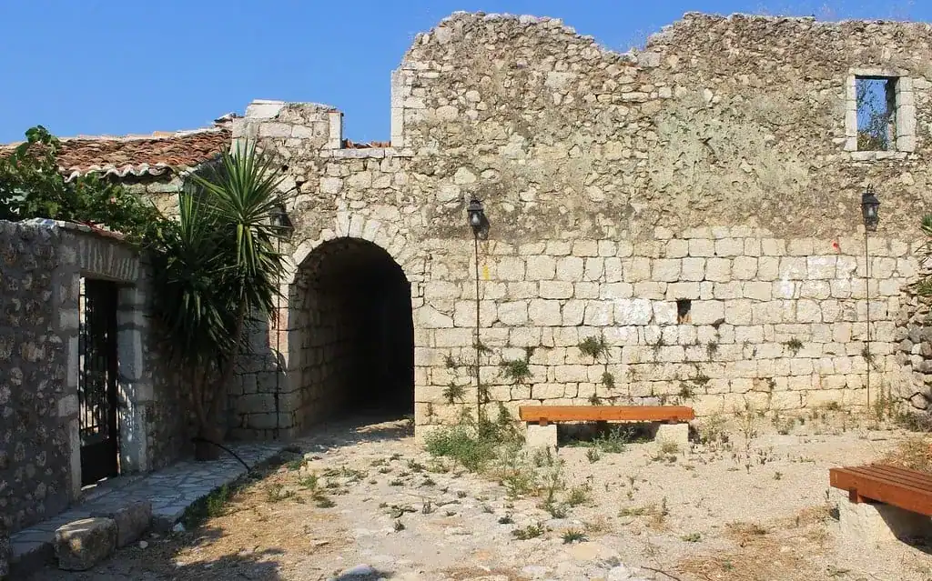 The stone entrance arch of Himarë Castle in the old town on the hill