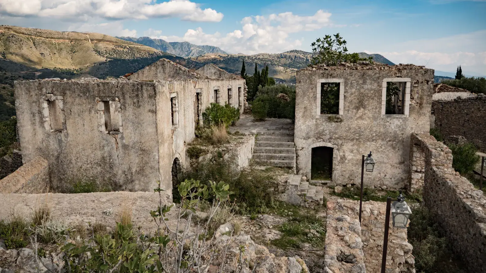 Stone walls of Himara Castle above the Ionian. Albania sits outside the Schengen Area and keeps its own visa clock