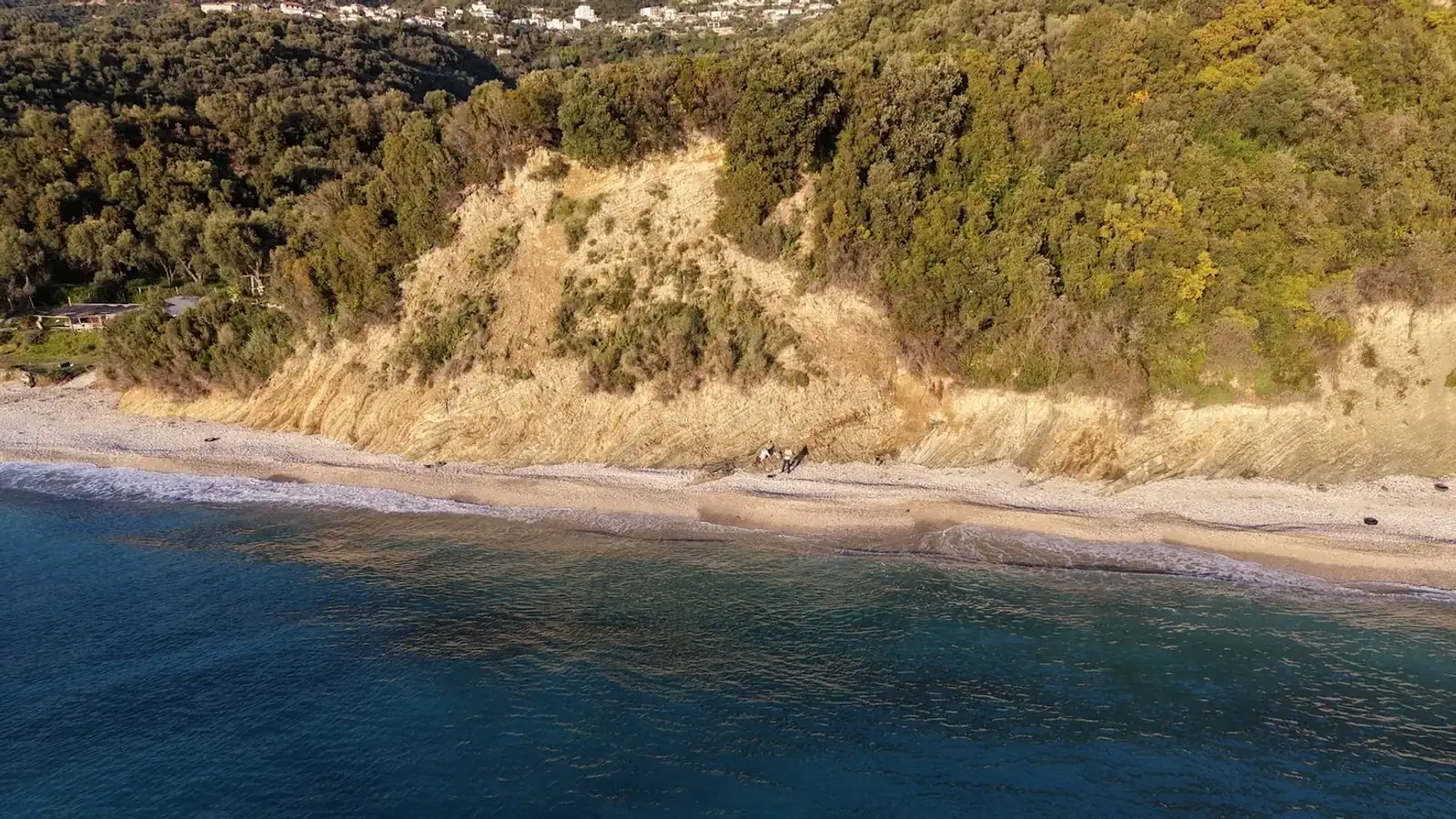 Coastal view of Himara apartment area along the Albanian Riviera shoreline