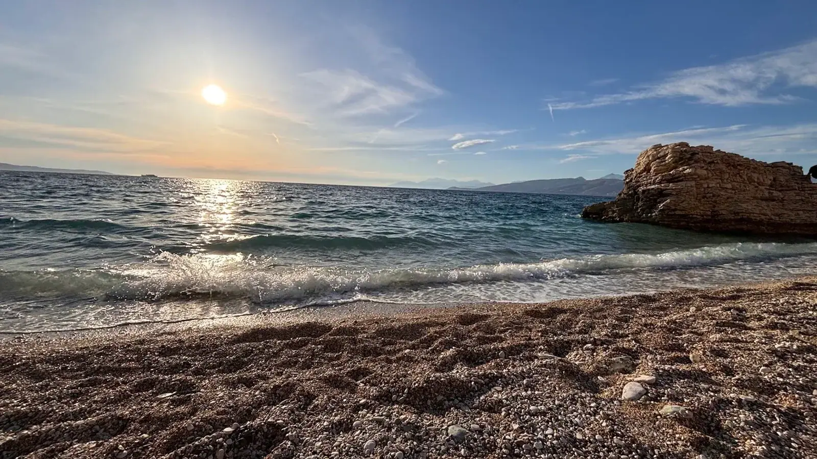 Himara Spile coastline during quiet winter months with muted sunset light