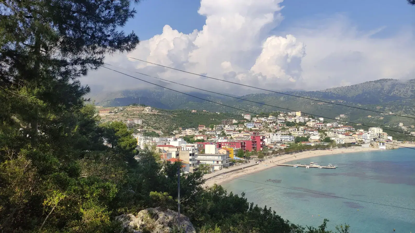 Himara Spile beach and old town coastline in early spring light