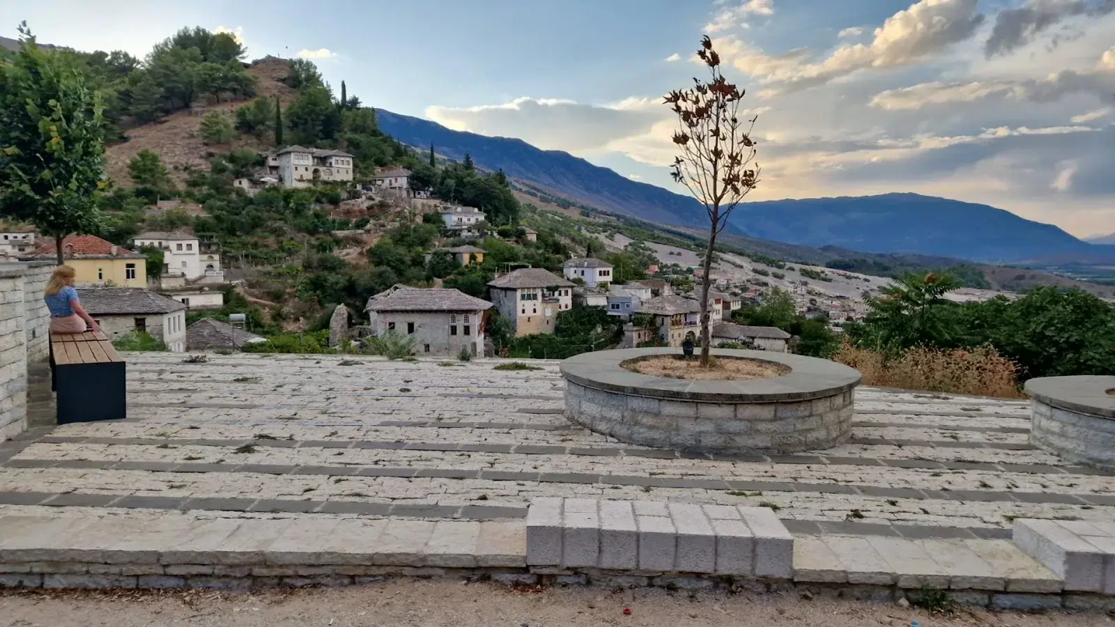 Sunset view along a coastal road on the Albanian Riviera heading toward the Kakavia border