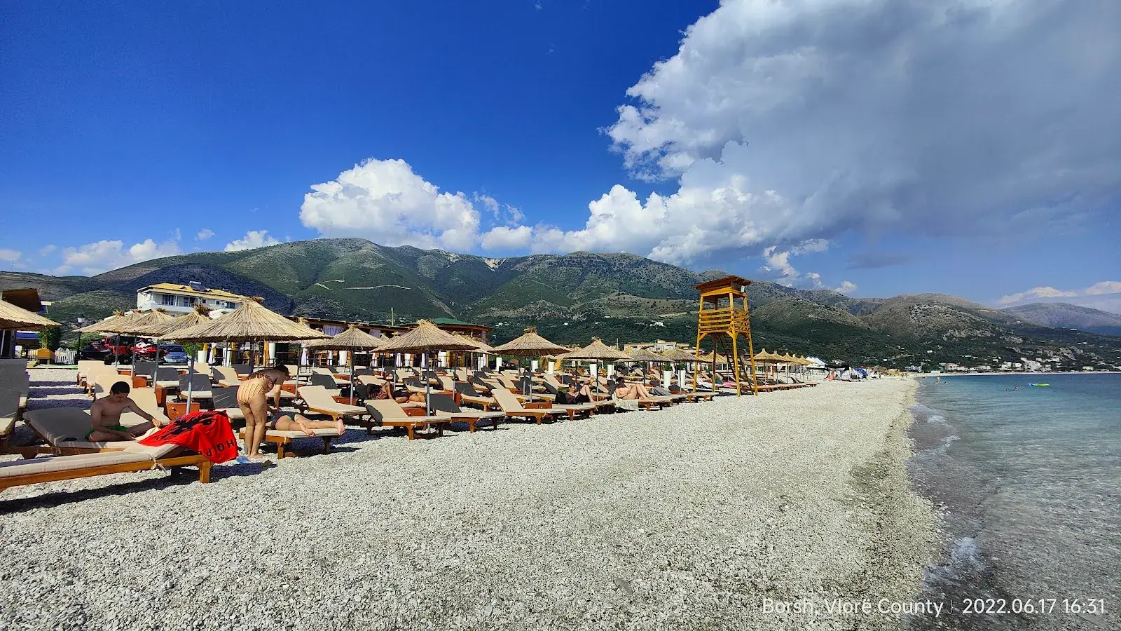 Borsh Beach club with sunbeds and parasols