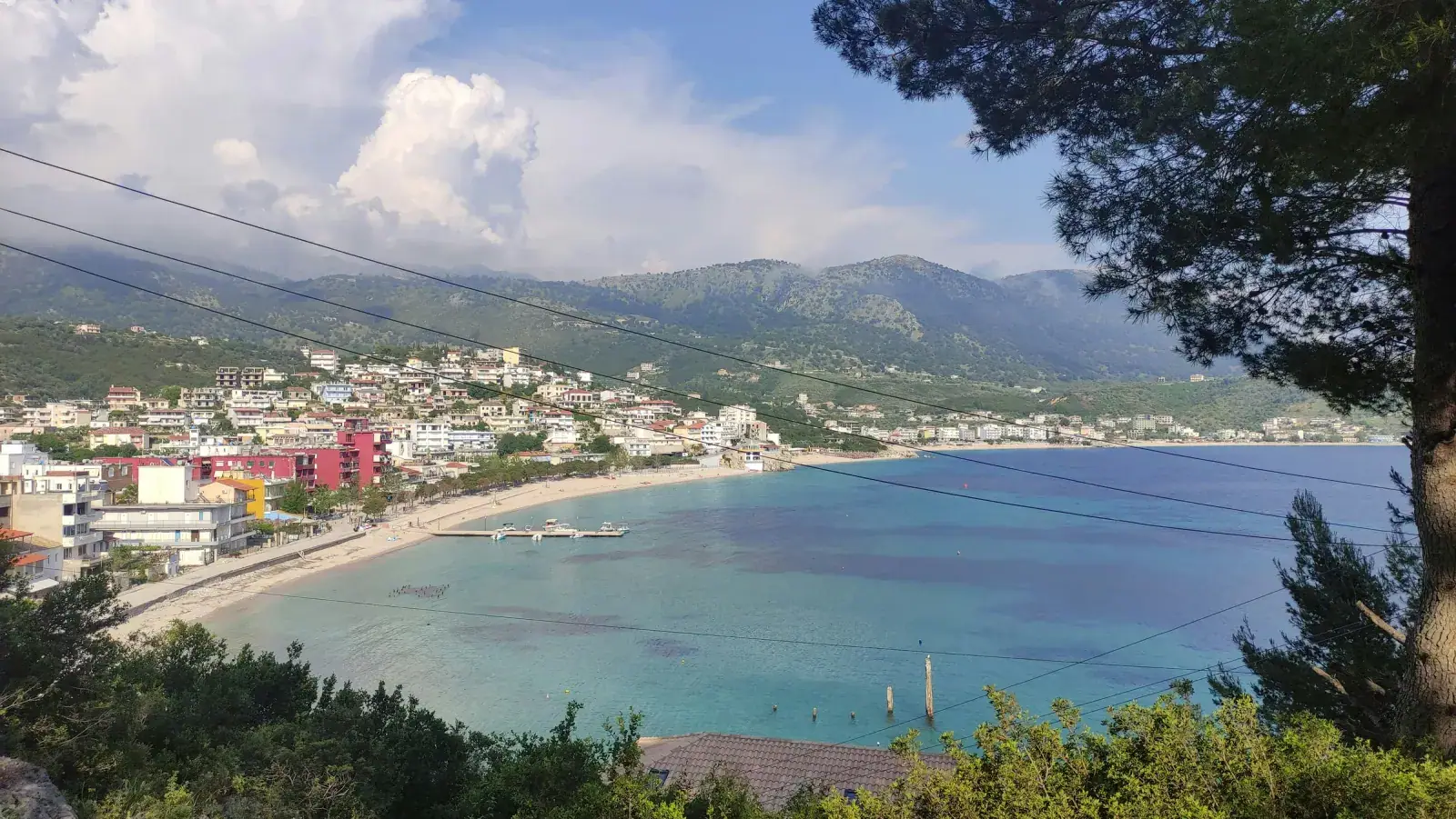 Open Ionian sea view from Spile Beach in Himara at sunset, looking south toward Greece