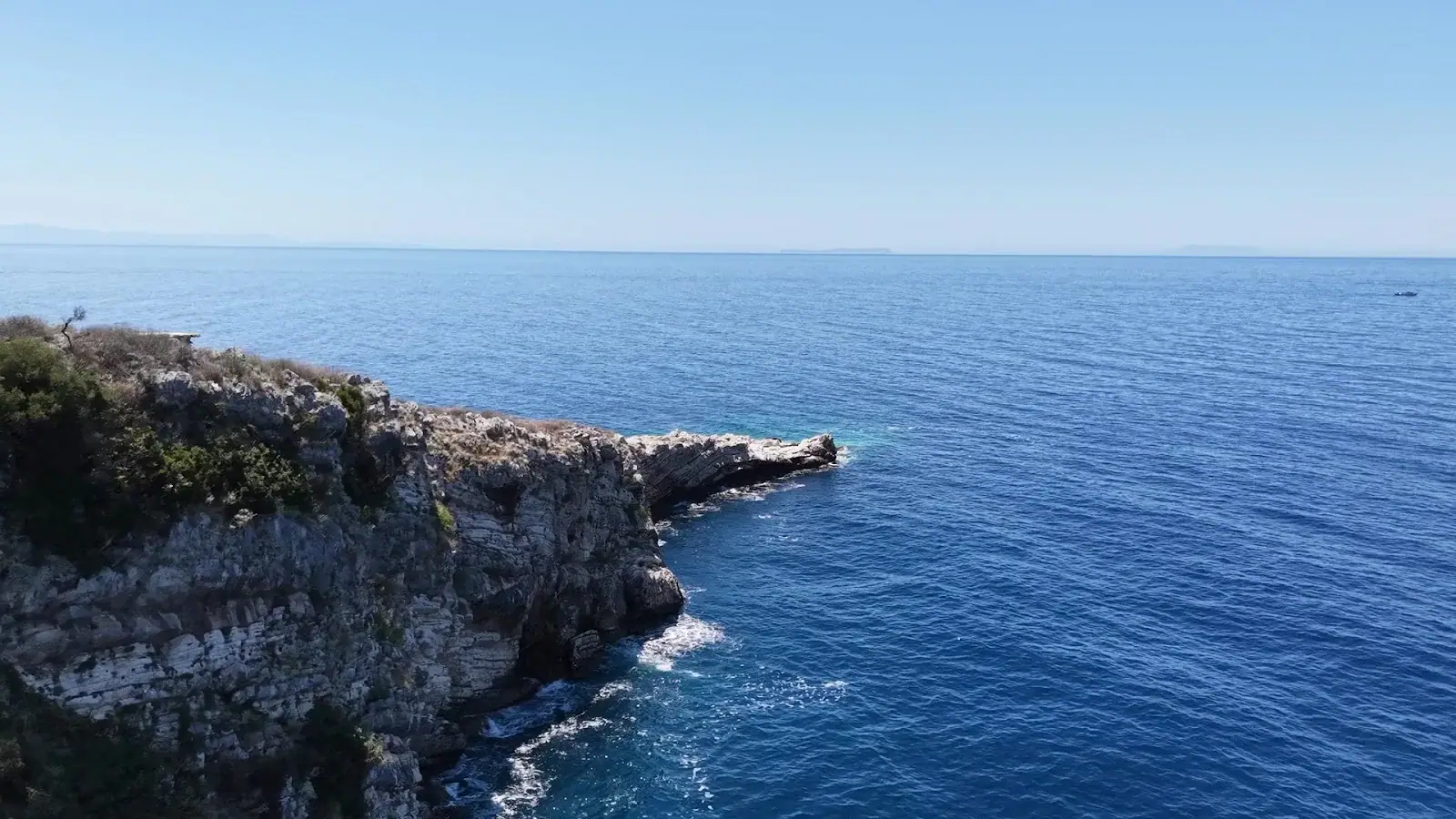 The rocky headland of Cape of Rigon reaching into the sea