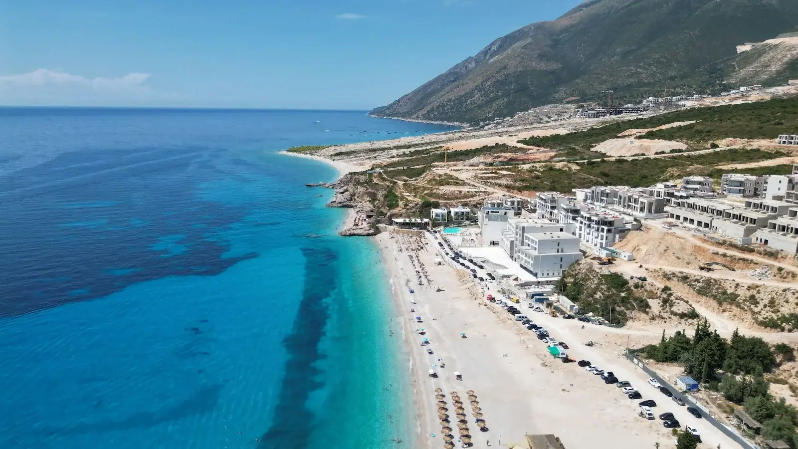 Aerial of Drymades Beach and its turquoise bay