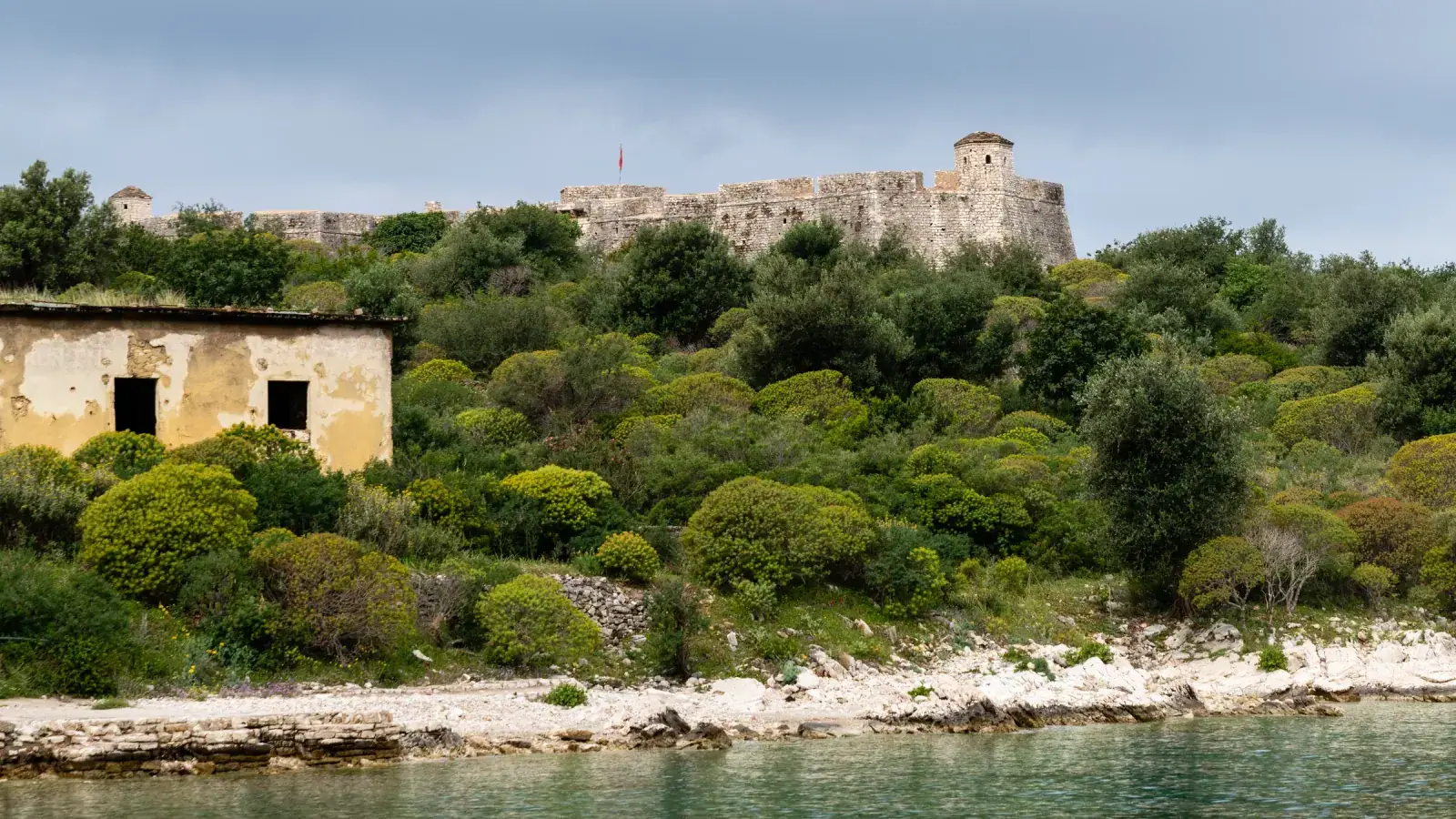 Porto Palermo Castle on its peninsula overlooking the Ionian Sea — one of many landmarks near Himara