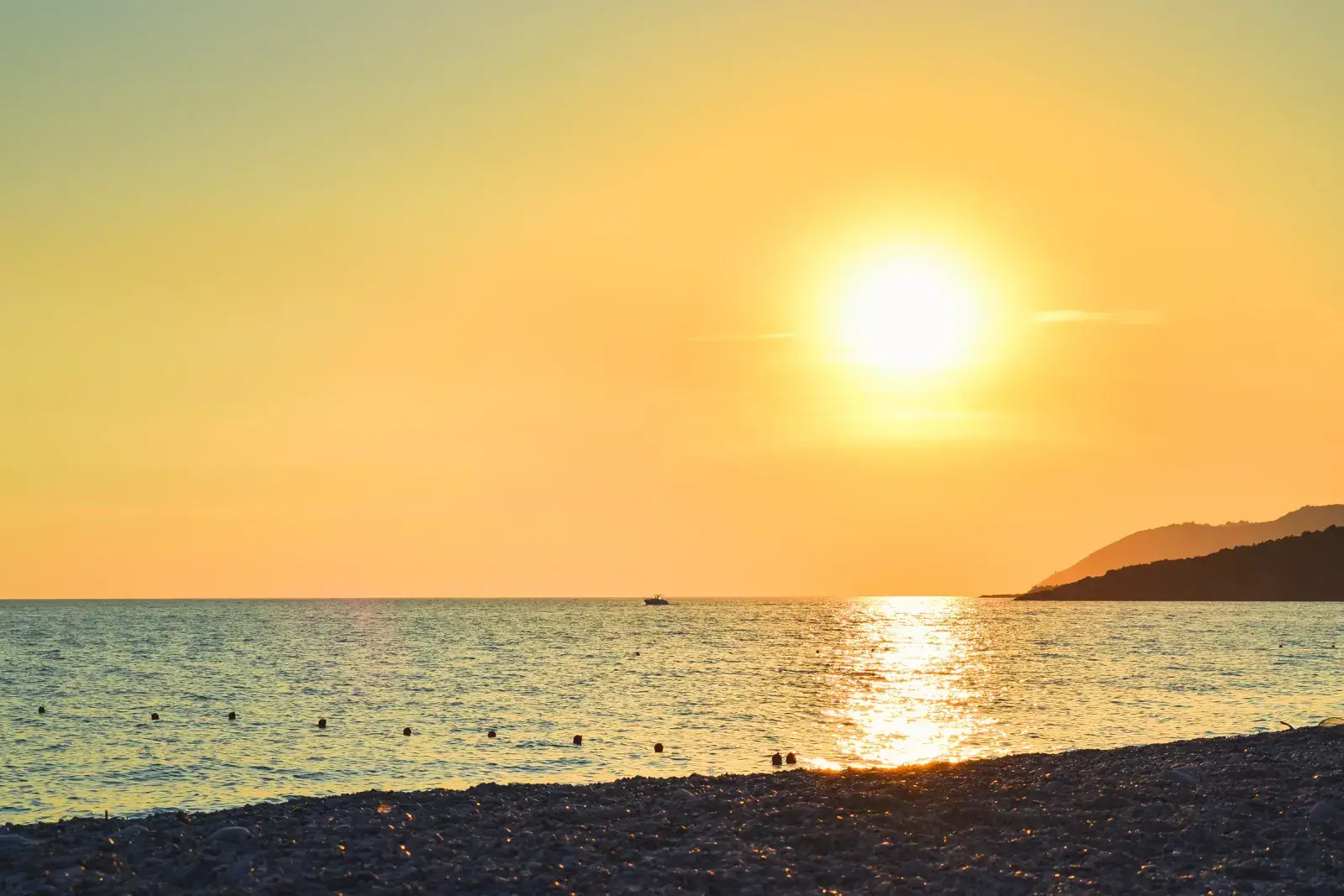 Golden sunset over Livadhi Beach on the Albanian Riviera