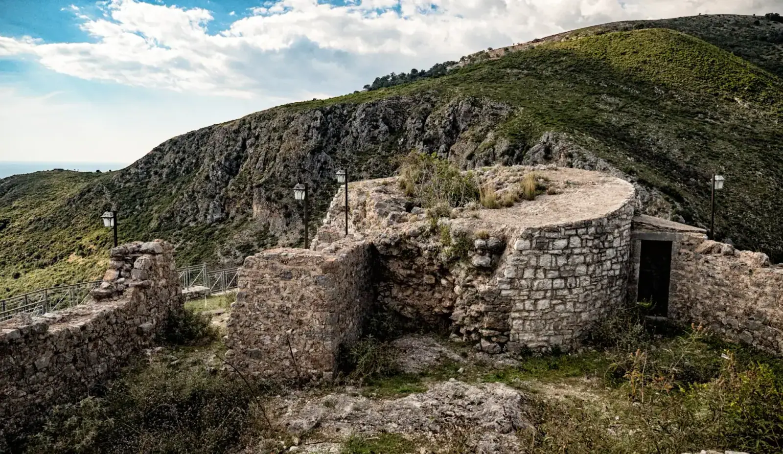 Stone walls and Byzantine church ruins at Himara Castle overlooking the coast