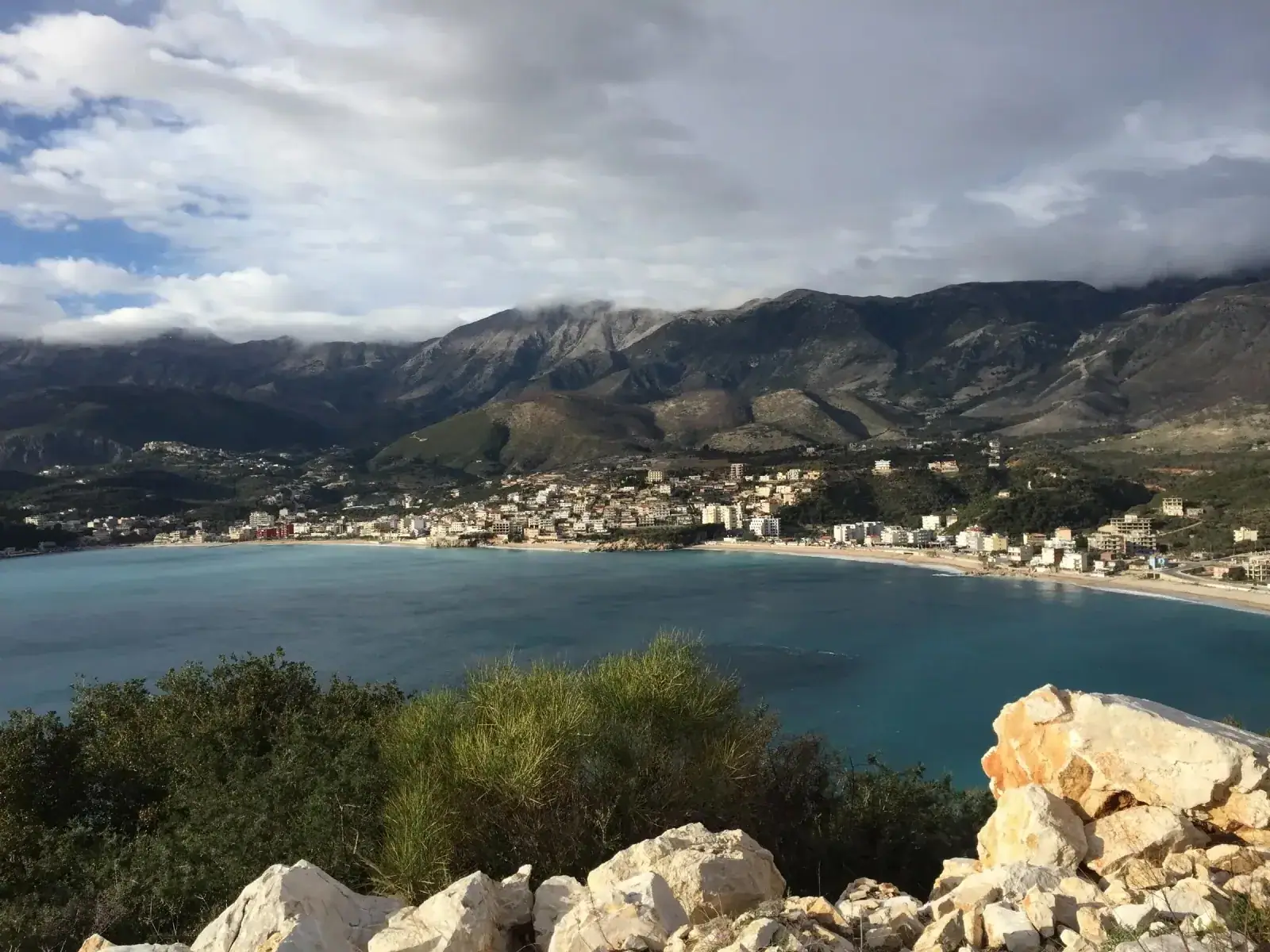 Boats moored along the Himara coastline on the Albanian Riviera