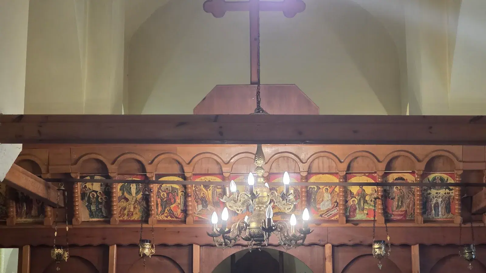 Carved and painted wooden iconostasis inside the Orthodox monastery church of Saint Demetrius in Lower Qeparo