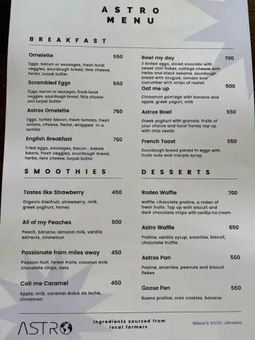 The printed Astro menu, black type on white paper with pale periwinkle stars behind it