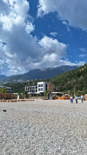 Dhermi Beach club and waterfront restaurants