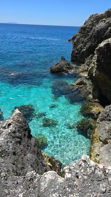 Rock formations in the bright shallows at Alevra