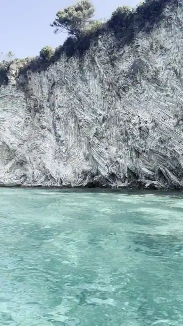 White rock and clear shallows at Cape of Qefali