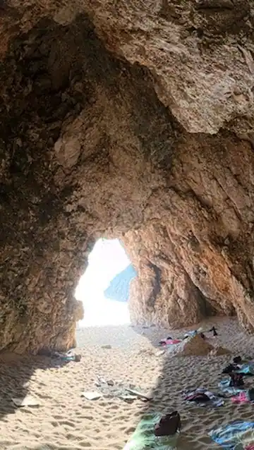 Pigeon's Cave on the Albanian Riviera coast at sunset