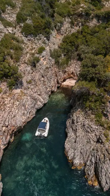Bayamar Adventures speedboat on the turquoise Ionian Sea off Himara, Albanian Riviera