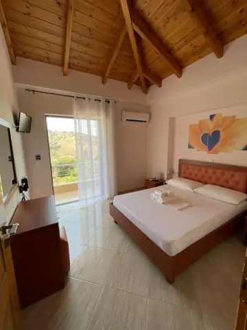 Family Room with Balcony at Belvedere Hotel & Suites