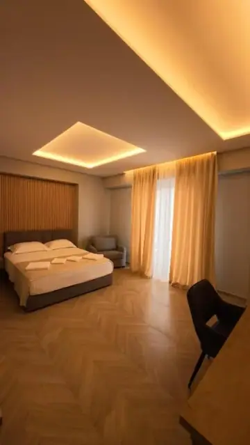 Deluxe Double Room (2 Adults + 1 Child) at Ferdinand Residence