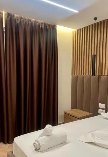 Triple Room with Balcony at Karos Hotel Llaman