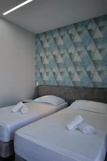 Triple Room with Garden or City View at The Blue Wave Hotel