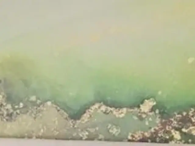 The painted panel behind the twin at Hotel Potami, photographed close