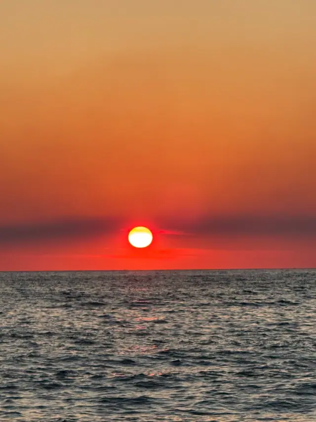 Albanian coastline at sunset where ride-hailing apps connect travelers across the Riviera