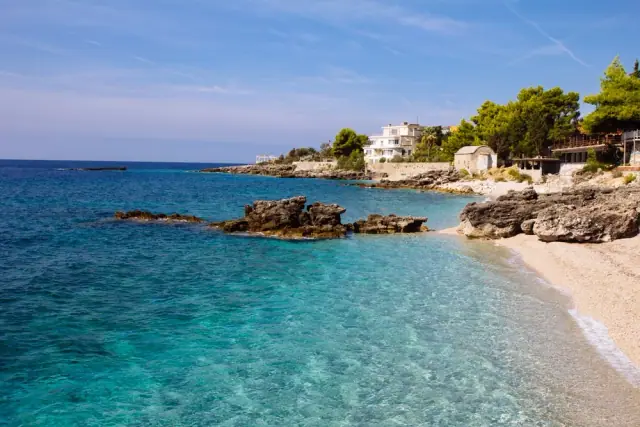Dhermi Beach Ionian water against the Ceraunian mountains