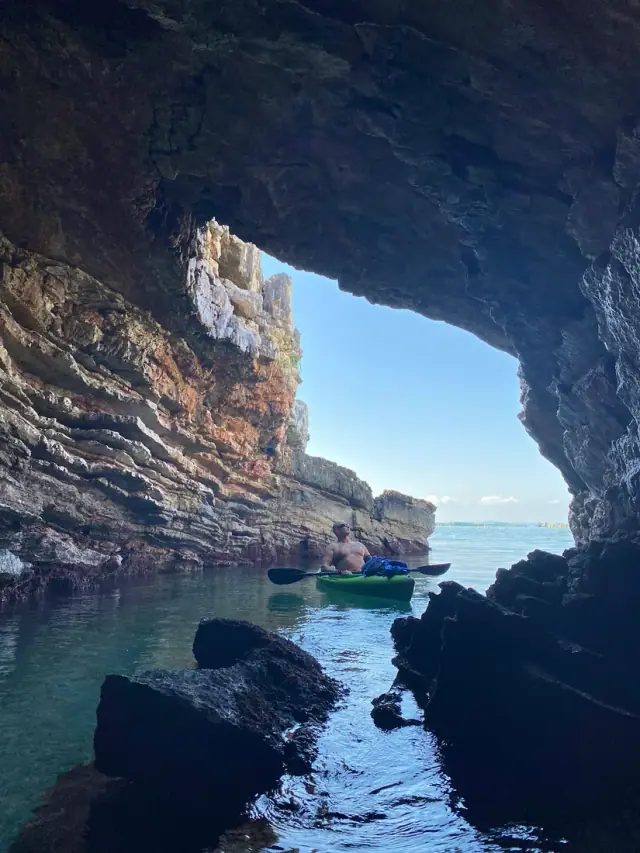 Looking out through the arch of Turtle's Cave to open sea