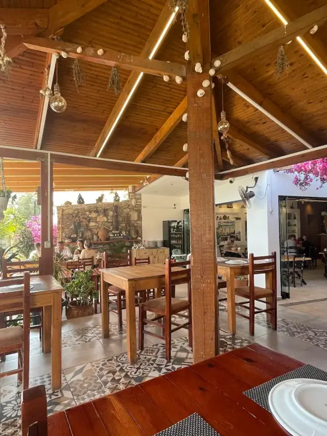Covered wooden dining terrace at Taverna Velco in Potam, Himara